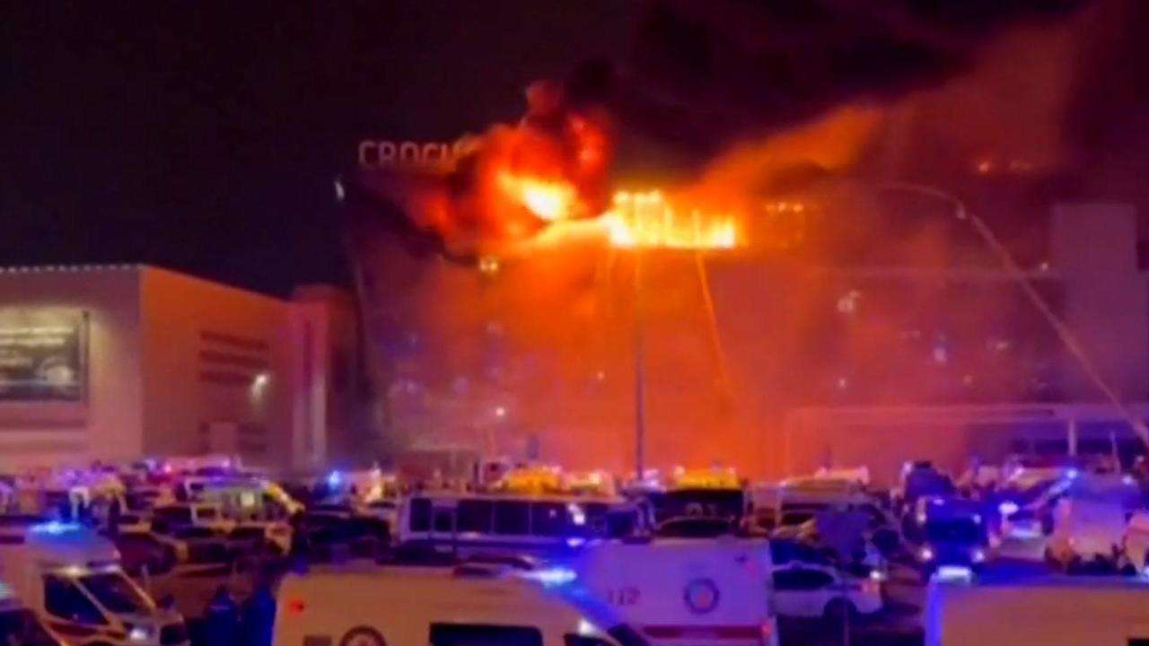 A massive blaze is seen over the Crocus City Hall on the western edge of Moscow, Russia, Friday, March 22, 2024.